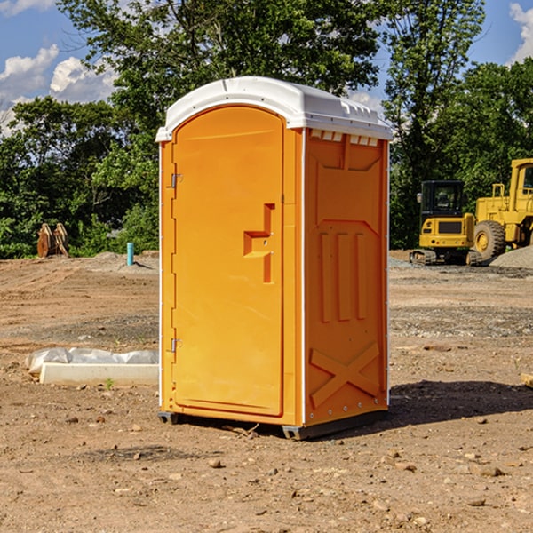 how often are the portable restrooms cleaned and serviced during a rental period in Manistee Lake Michigan